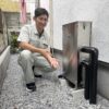 記念撮影。家中まるごと浄水器®と共に。
