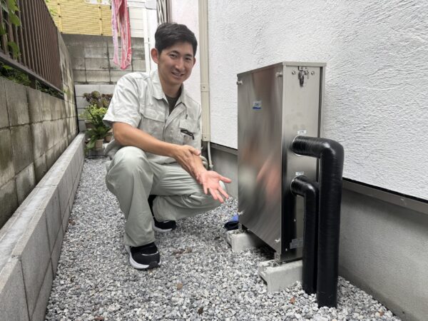 記念撮影。家中まるごと浄水器®と共に。