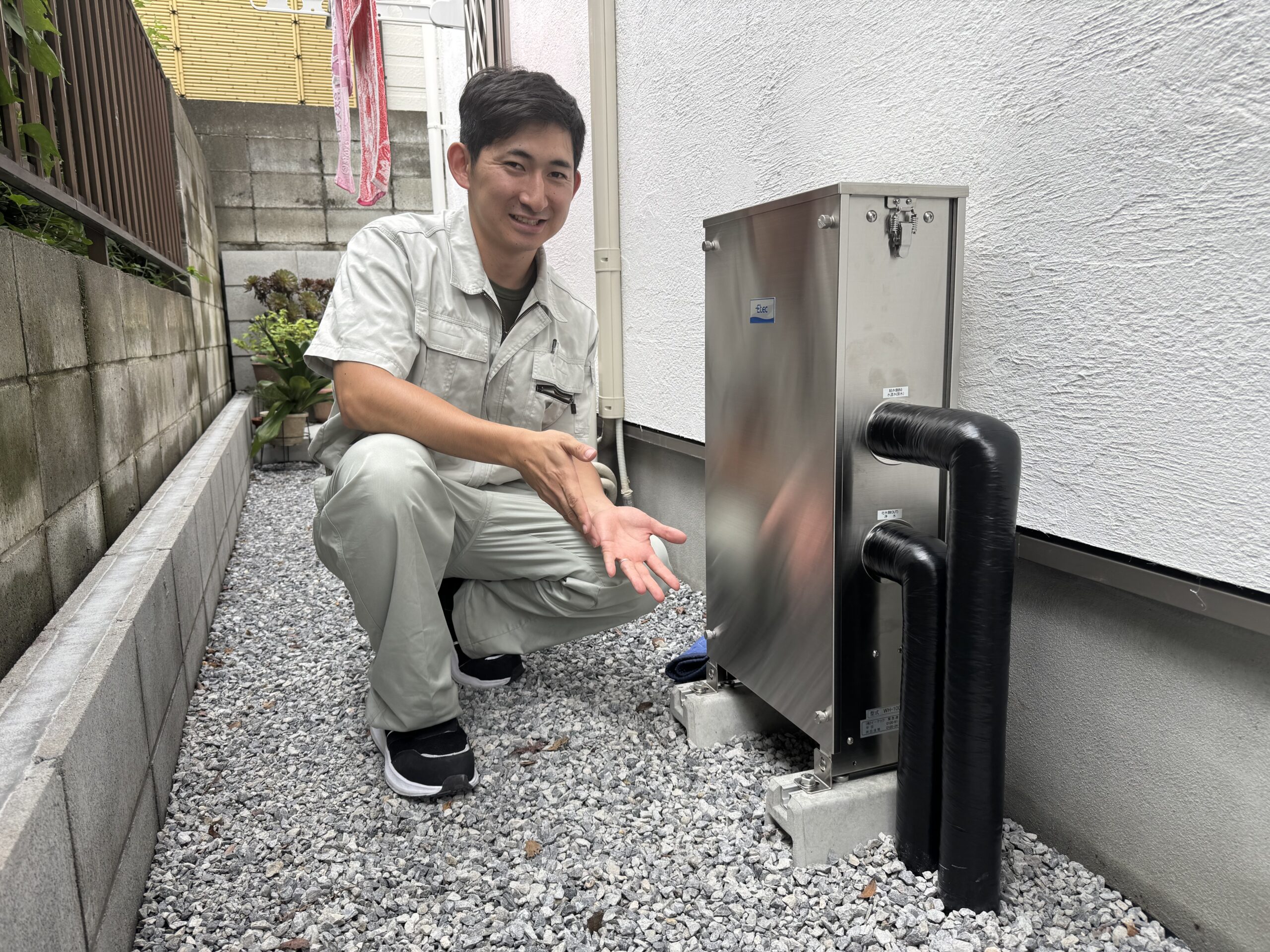 記念撮影。家中まるごと浄水器®と共に。